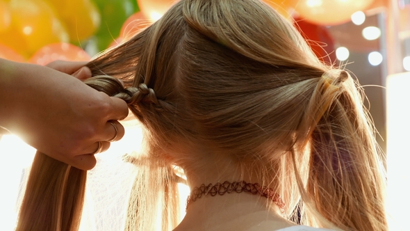 Female Model Getting Her Hair Dressed