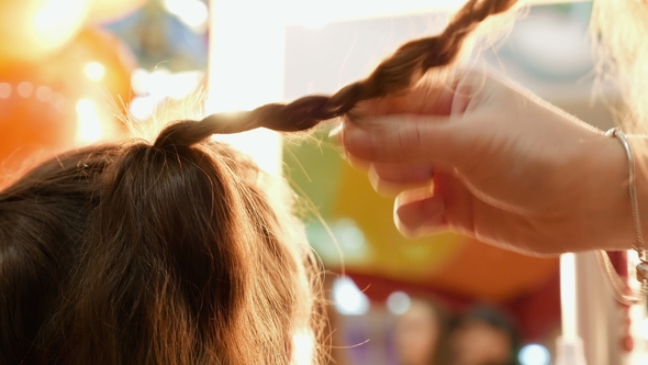 Female Model Getting Her Hair Dressed