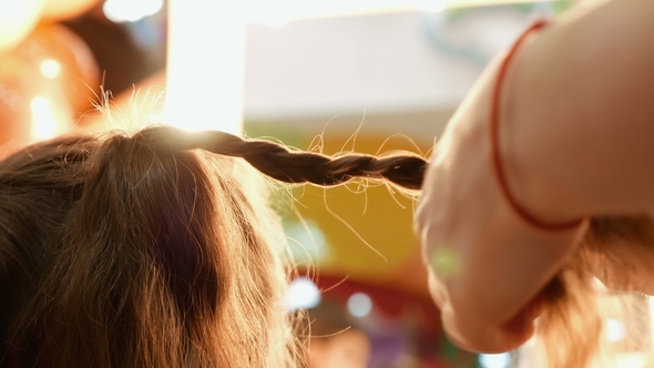 Female Model Getting Her Hair Dressed