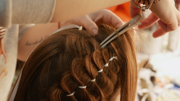 Female Model Getting Her Hair Dressed