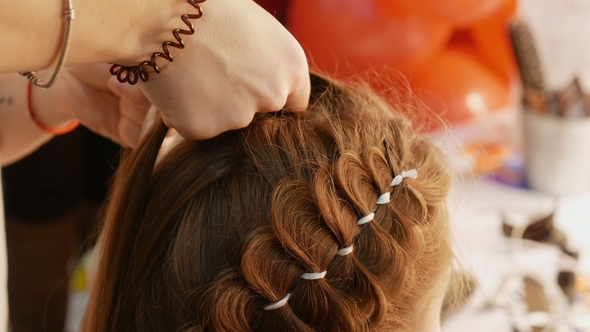 Female Model Getting Her Hair Dressed