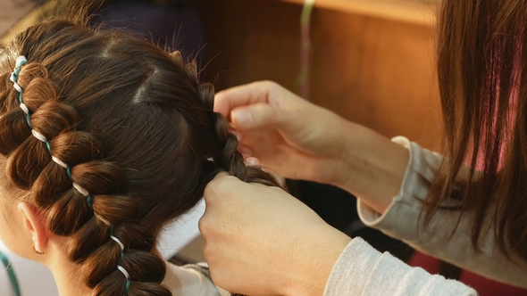 Female Model Getting Her Hair Dressed