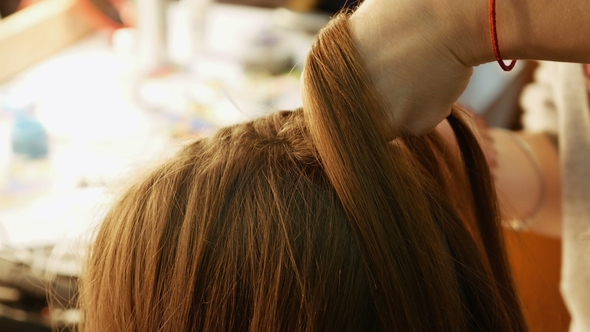 Female Model Getting Her Hair Dressed