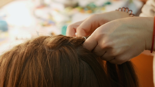 Female Model Getting Her Hair Dressed