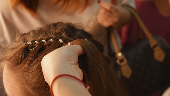 Female Model Getting Her Hair Dressed