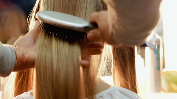 Female Model Getting Her Hair Dressed