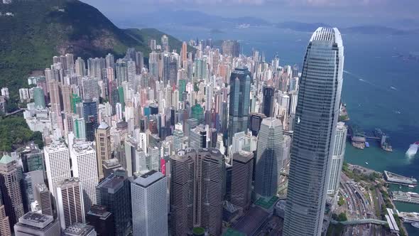 Drone Fly Down Over the Central District in Hong Kong City