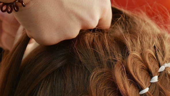 Female Model Getting Her Hair Dressed