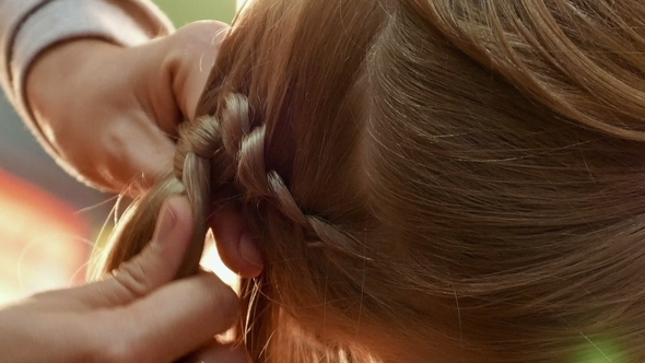 Female Model Getting Her Hair Dressed