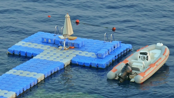 Floating Jetty Dock Over Coral Reef at Sea Resort