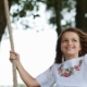 Adorable Smiling Long-haired Girl Sways on a Wooden Swing Seat  - VideoHive Item for Sale