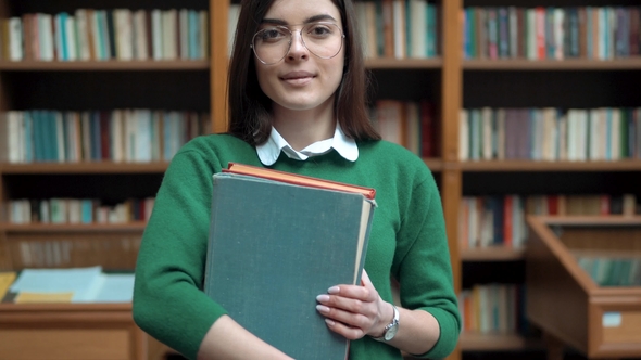 Portrait of Female Student in Library