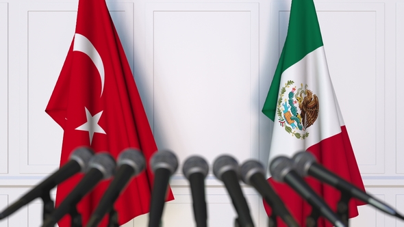 Flags of Turkey and Mexico at International Press Conference alt