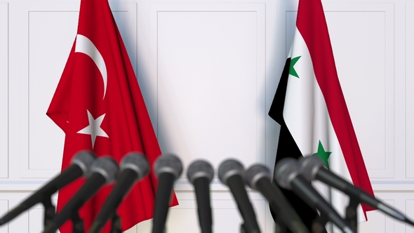 Flags of Turkey and Syria at International Press Conference alt