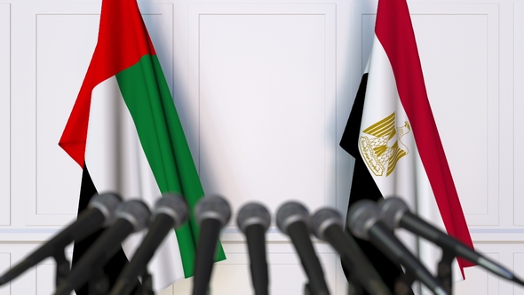Flags of the UAE and Egypt at International Press Conference alt