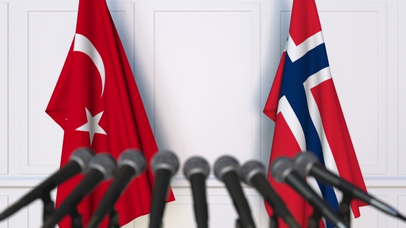 Flags of Turkey and Norway at International Press Conference alt