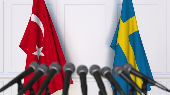 Flags of Turkey and Sweden at International Press Conference alt