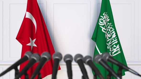 Flags of Turkey and Saudi Arabia at International Press Conference alt