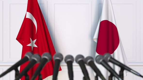 Flags of Turkey and Japan at International Press Conference alt