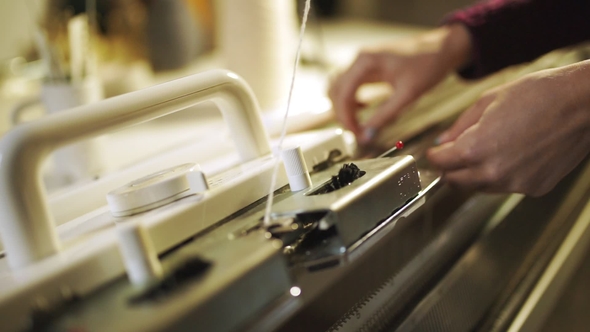 Woman Knitter Hand Working on Weaving Machine Knitting Machine Production