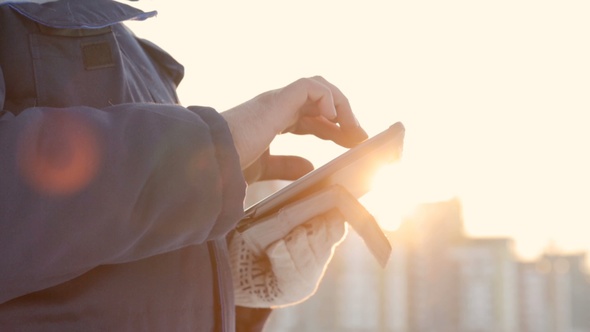 Foreman With Tablet at Major Construction Project