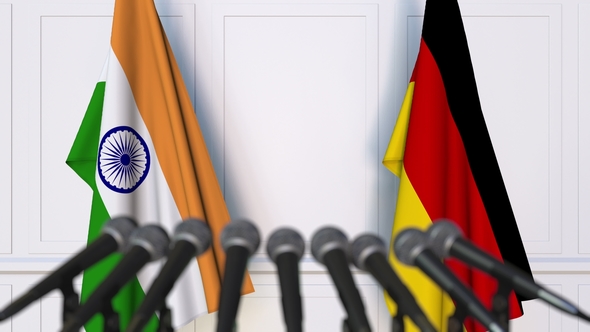 Flags of India and Germany at International Press Conference alt