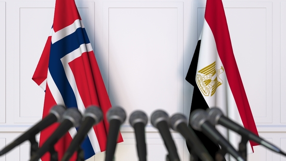 Flags of Norway and Egypt at International Press Conference alt