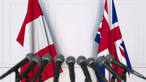 Flags of Peru and The United Kingdom at International Press Conference alt