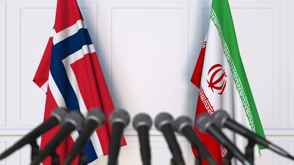 Flags of Norway and Iran at International Press Conference alt
