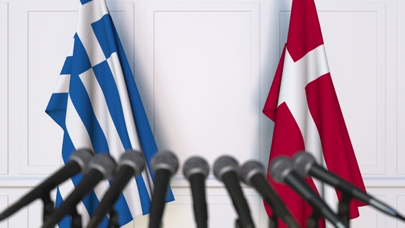 Flags of Greece and Denmark at International Press Conference alt