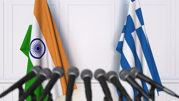 Flags of India and Greece at International Press Conference alt