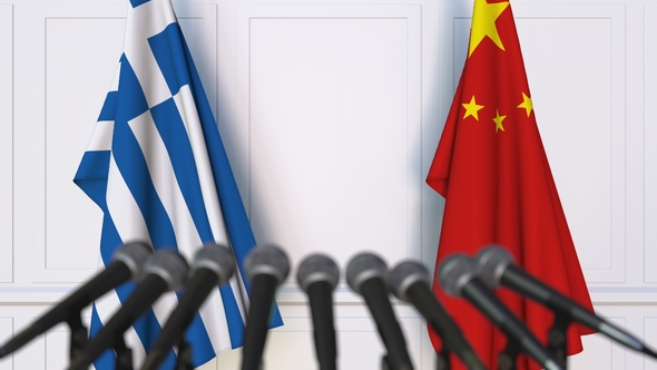 Flags of Greece and China at International Press Conference alt