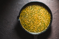 Yellow curry paste on a cast-iron frying pan. Indian food - PhotoDune Item for Sale