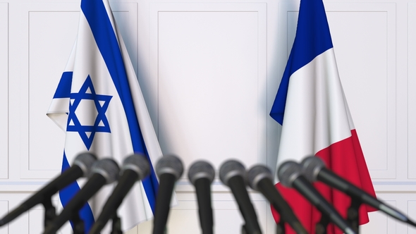 Flags of Israel and France at International Press Conference alt
