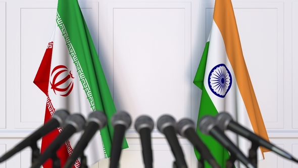 Flags of Iran and India at International Press Conference alt