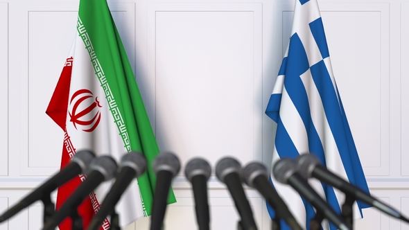 Flags of Iran and Greece at International Press Conference alt