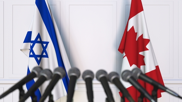 Flags of Israel and Canada at International Press Conference alt