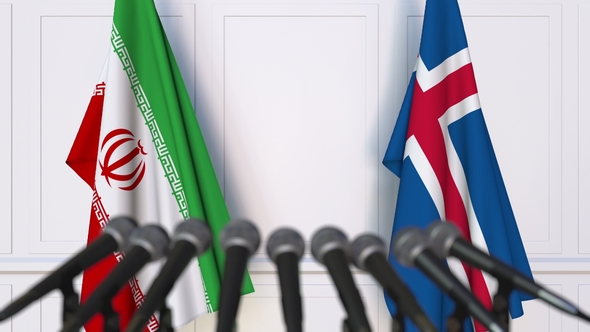 Flags of Iran and Iceland at International Press Conference alt