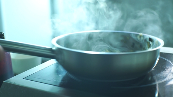 the Chef Fry Fresh Vegetables in a Pan