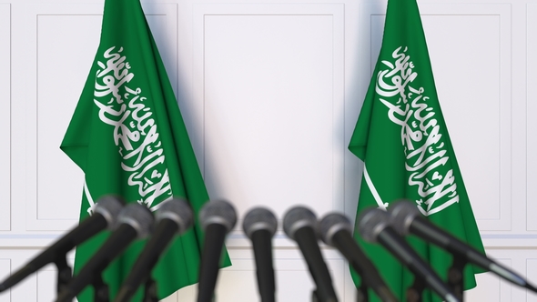 Official Press Conference Featuring Flags of Saudi Arabia alt