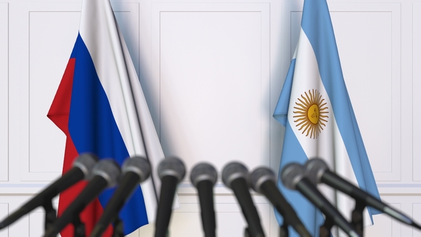 Flags of Russia and Argentina at International Press Conference alt