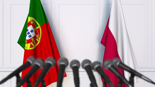 Flags of Portugal and Poland at International Press Conference alt