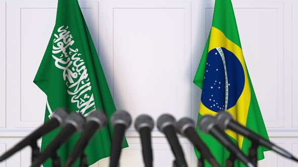 Flags of Saudi Arabia and Brazil at International Press Conference alt