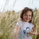 Lovely, Cute Baby-girl Running Through the High-grass and Smiles Happily Playful Mood, Joyful Time - VideoHive Item for Sale