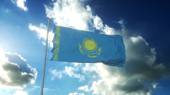 Flag of Kazakhstan Waving at Wind Against Beautiful Blue Sky