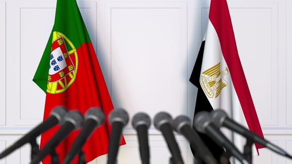 Flags of Portugal and Egypt at International Press Conference alt