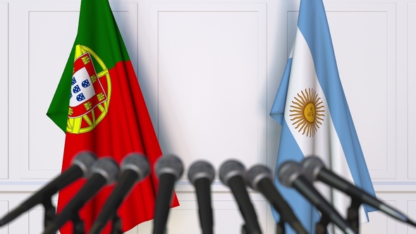 Flags of Portugal and Argentina at International Press Conference alt