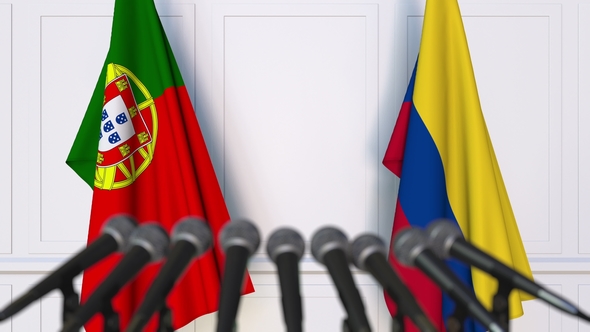 Flags of Portugal and Colombia at International Press Conference alt