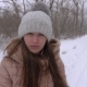 Serious Girl in Strong Snowstorm in Winter - VideoHive Item for Sale