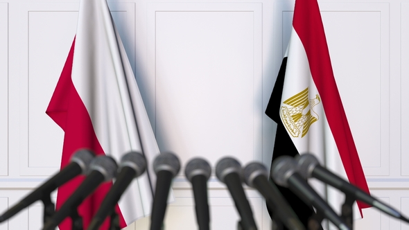Flags of Poland and Egypt at International Press Conference alt